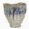 The Oyster White &amp; Indigo Blue Vase is a handcrafted masterpiece from