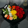Bouquet of red and orange roses with yellow and white flowers in black wrap