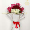 Bouquet of red and white roses wrapped in white paper with a red ribbon