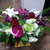 Fresh flowers with roses, lilies,  orchids,  Gerber daisies and Alstromeria