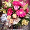 Order this stunning mix of roses, hydrangea, gerber daisies, orchids, lilies, alstromeria