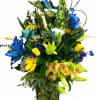 Cymbidium Orchids, Gerbera Daisies, Roses, Calla Lilies, and dyed blue Oriental Lilies