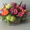 colorful blooms in a designer basket. 
