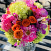 Green hydrangeas , hot pink dahlias , hot pink Mokara , orange
