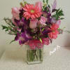 This is a gorgeous bouquet of pink roses, purple orchids, Oriental lilies