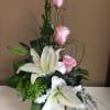 A beautiful arrangement of Roses and Lilies 
