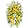 A gorgeous arrangement of yellow cymbidium orchids and other orchids and blooms