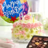 
Our signature floral birthday cake may look good enough to eat, but