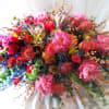 Exotic blooms from around the world compose this fitting memory for the
