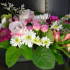 Pink Lily, Lavender Roses, Spray Roses, Gerbera Daisies, Limonium, White Cushion poms