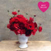 Beautiful arrangement of red ranunculus and anemones perfect for your Valentine. In