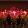 Collection of 3 small floral arrangements in seasonal colors &amp; flowers. 