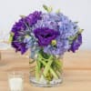 This gorgeous floral arrangement full of blue and indigo undertones is perfect