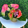 You can&#039;t stop the heat on this new piece. Artistically placed anthurium