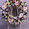 Pink roses,  yellow roses, pink carnations, lilies, lemon leaves Gerber daisy