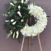 Medium  wreath with hydrangeas, lilies, calla lilies, snapdragon, pom pom, spider