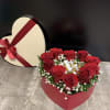 11 red stems roses in the red heart box