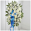 The Exquisite Tribute Standing Spray is an elegant display of sweet serenity.