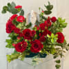 Elegant and emotional, this touching arrangement of rich red roses with delicate