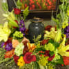 This urn wreath is a favorite for the fall season. The red