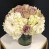 A touch of purple to bring out a white arrangement. Sometimes you