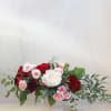 Send this display of blush, pink and red roses to someone special.