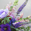 This arrangement of jeweled-toned arrangement makes a gem gift for any occasion