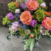 Vibrant blooms designed in our signature mason jar! 