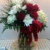 Full mix of red roses, red and white carns, white hydrangea and