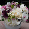 Mixture of white and lavender garden Roses, elegant white Orchids and Freesias