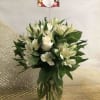 White alstroemeria and white roses are just the right touch of elegance