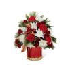 Drum up plenty of holiday cheer with this joyful floral display that