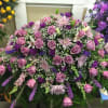 Family selects colors and Designer selects best design and carnations. Ribbon to