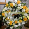 Available in nearly all colors, this wreath is a fitting tribute for
