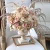 This Chocolato arrangement is made with dusty and blush roses and pampas.