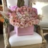 This Chocolato arrangement is made with Pink Roses with Pampas. The arrangement