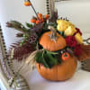 This Chocolato arrangement is made with Pumpkins, Roses, Leaves, Pampas and Dried
