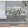 SEASONAL FLOWERS, SUCH AS, ROSES, SNAPS LILIES AND MORE. CASCADING DISPLAY OF