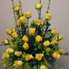 Rose arrangement shown in yellow, available in other color palettes daily..... 