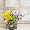Lilies and Orchids in a Round Glass Dish Garden
