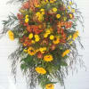 A very manly looking full easel spray, jam packed with everyday flowers