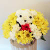 Adorable puppy design created with carnations and daisies.