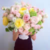 This Opulent and Luxurious Spring Garden Arrangement is Overflowing with Blush Ranunculus