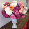 This Extra Large arrangement is filled with raspberry hydrangea and garden roses