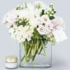 All white elegant blooms. White roses, tulips and hydrangeas. 