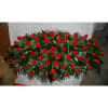 A lovely casket spray to remember with beautiful roses! Please choose a