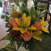 Yellow Lillies, Peach roses, Solidago,and assorted greens