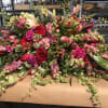 Our artisan handmade arrangement&#039;s overall theme is different shades of pink. The