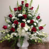 Beautiful white garden flowers with premium red roses