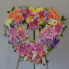 Pastel colors, mix of roses, lilies, hydrangeas, lisianthus.  Please see more